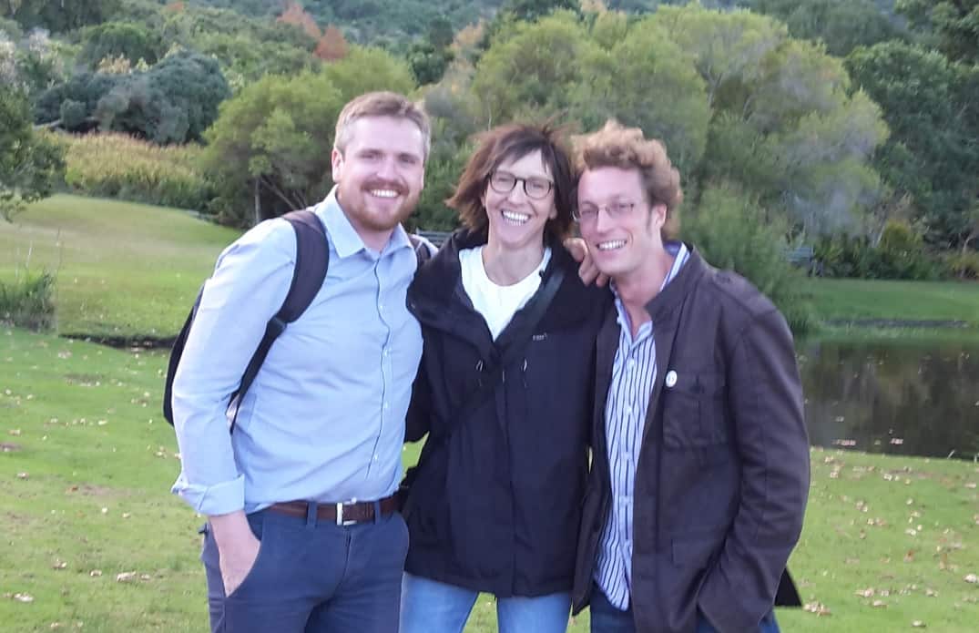 The Pragmatics outside smiling together